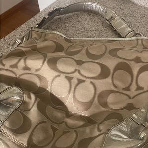 Coach purse amazing in silver all year around coach. 50 dollars